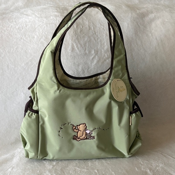 Disney Handbags - Disney Light Green 4 in 1 Winnie the Pooh Diaper Bag with Brown Trim